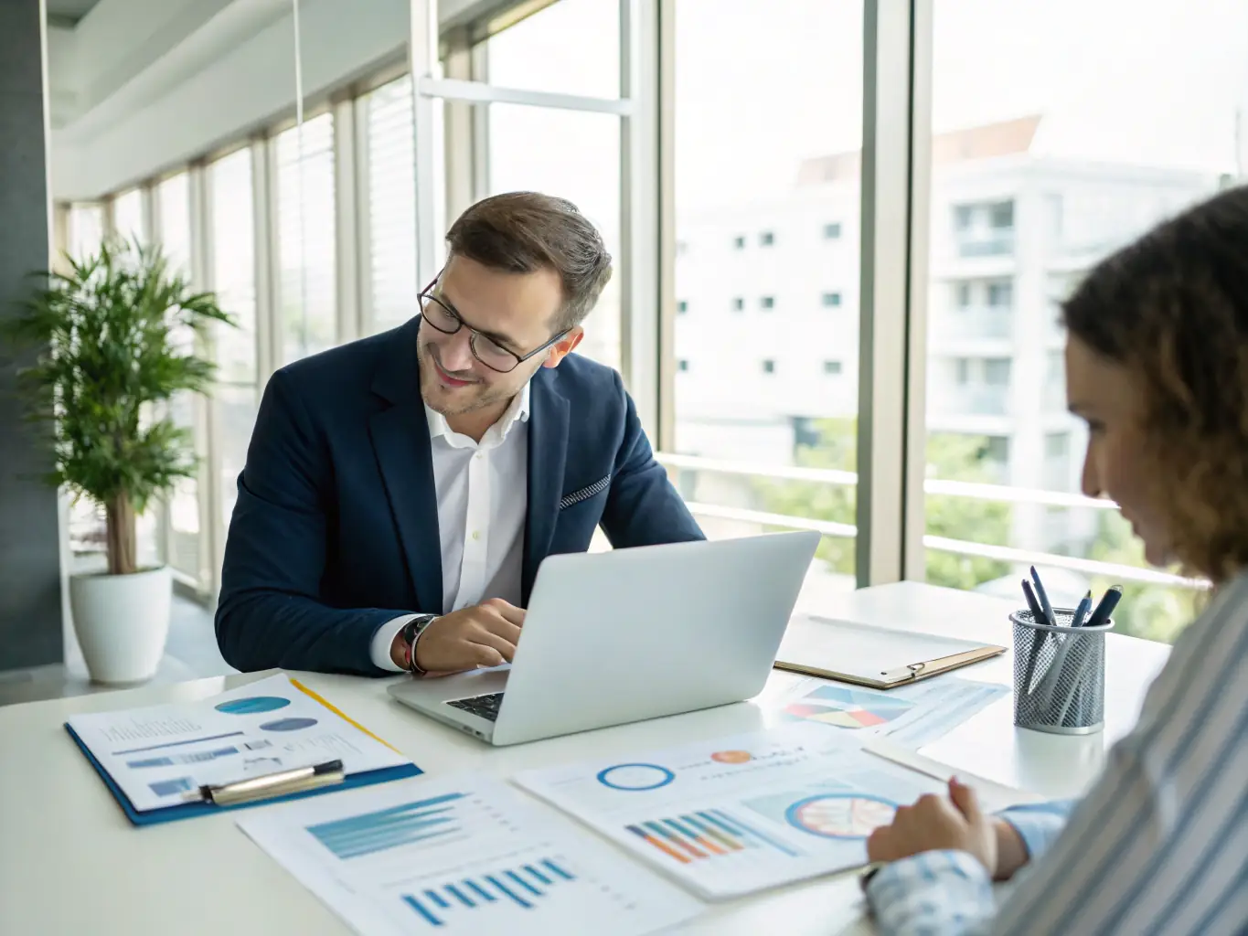 A consultant reviewing AI strategy documents with a client in a modern office setting, emphasizing collaboration and strategic planning.